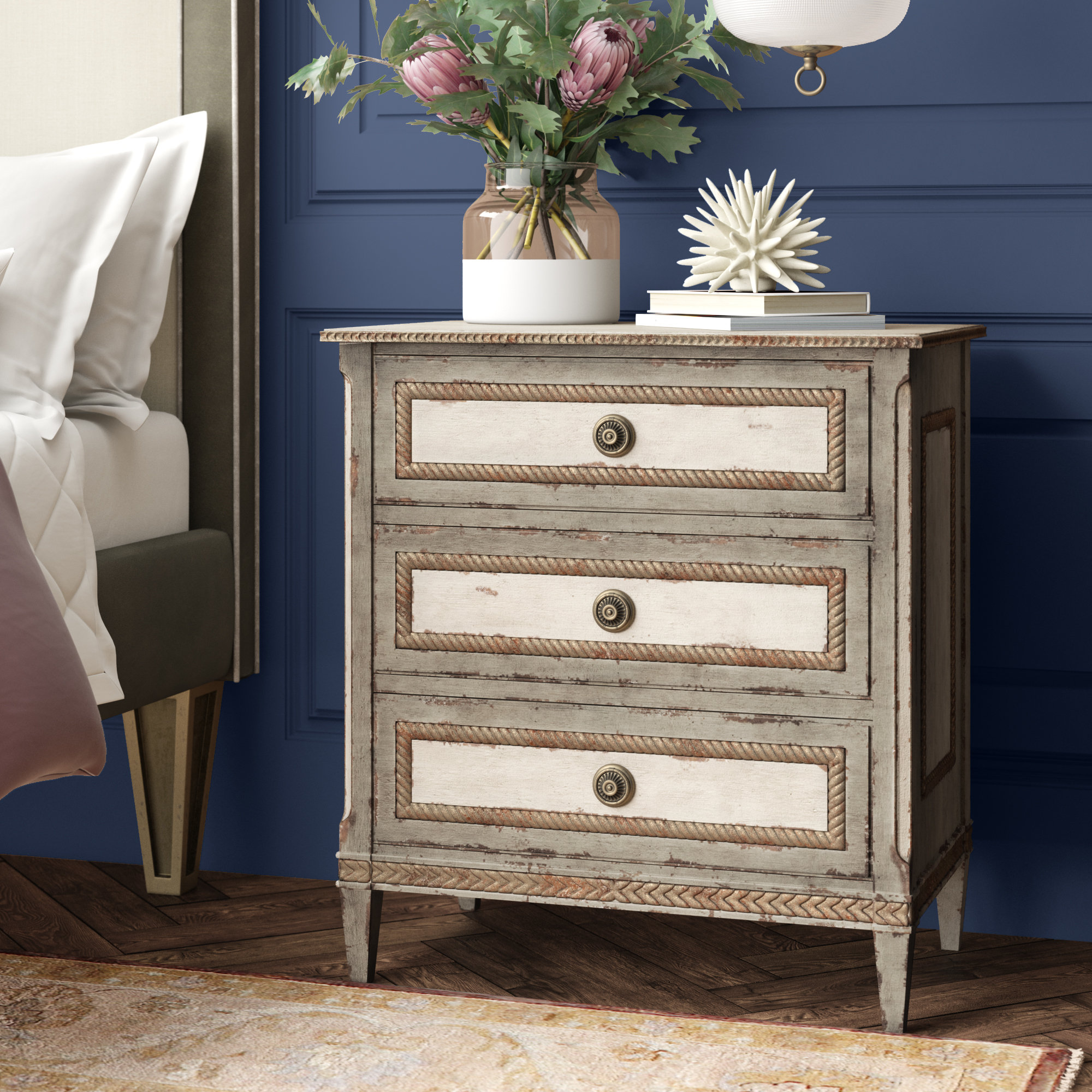 cream dresser and nightstand