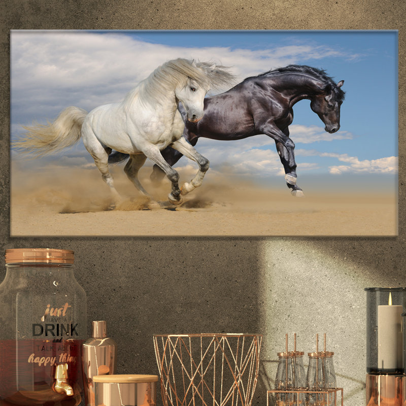 East Urban Home White And Black Horses Galloping In Desert