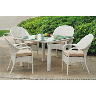 Go to store & view more images Isabell 5 Piece Dining Set with Sunbrella Cushions by Highland Dunes