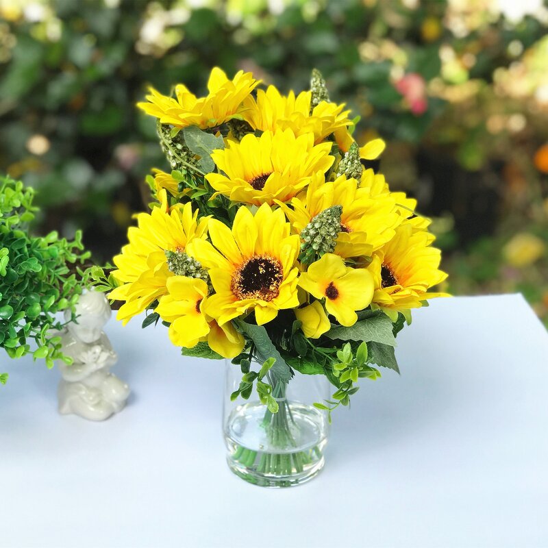 fake sunflowers in vase