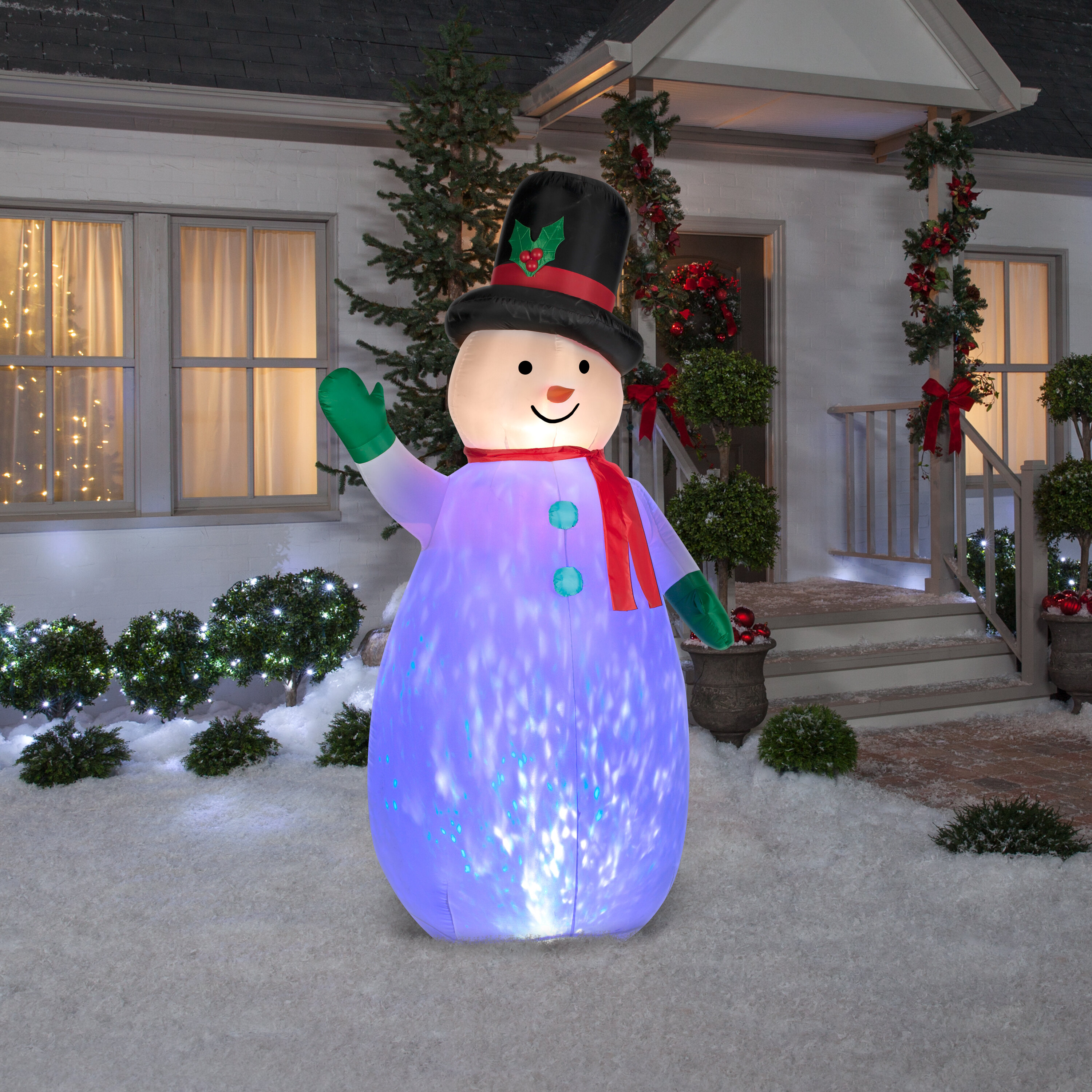 UNIFEEL 4ft Inflatable Snowman with Kaleidoscope Lightshow Colorful Light Merry Christmas Inflatable Lighted Yard Decoration with Blower and Adaptor for Winter Indoor Porch Outdoor Decor