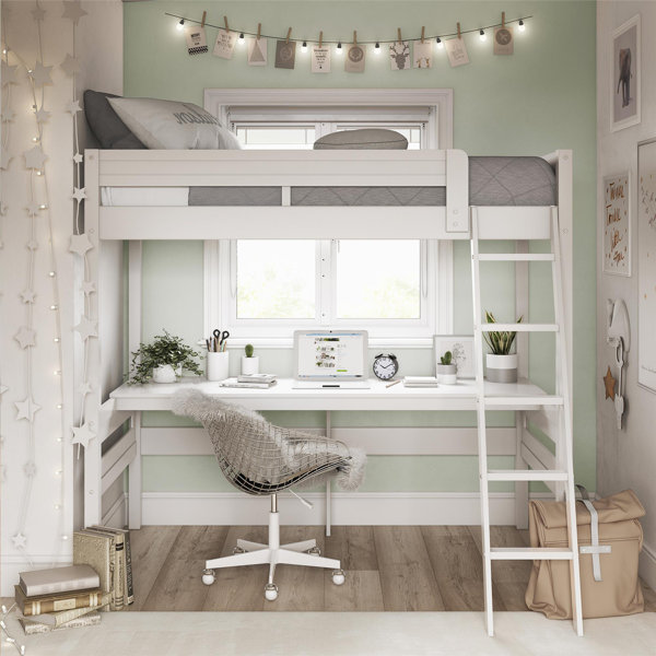 two bunk beds with desk