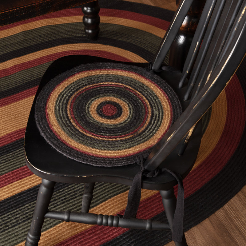 circle wooden chair with cushion