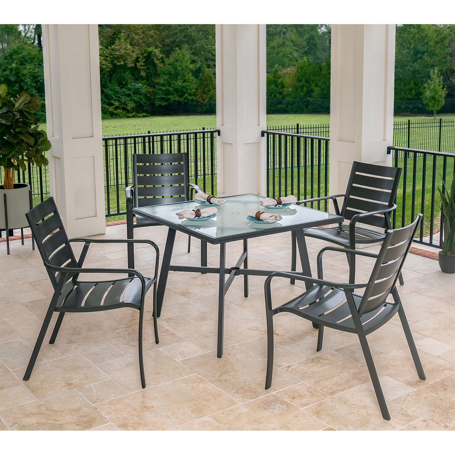 glass patio table and chairs with umbrella