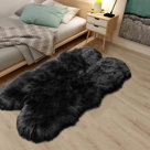 Everly Quinn Dosie Handmade Shag Faux Sheepskin Area Rug in Pink ...