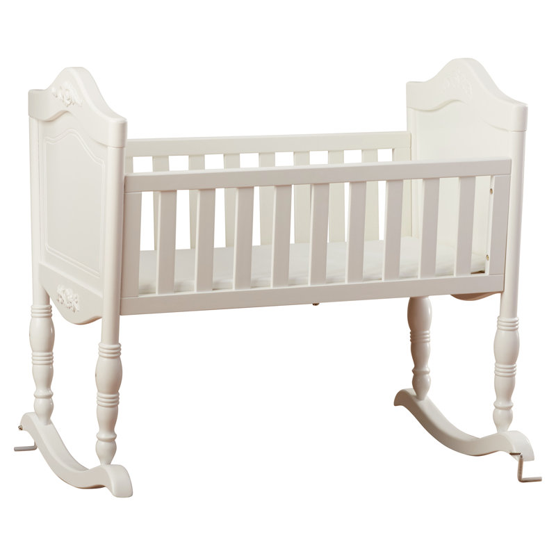 white rocking crib