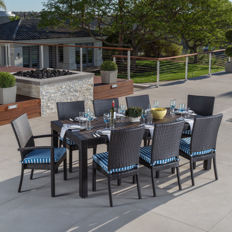 Northridge 9 Piece Sunbrella Dining Set with Cushion & Reviews AllModern