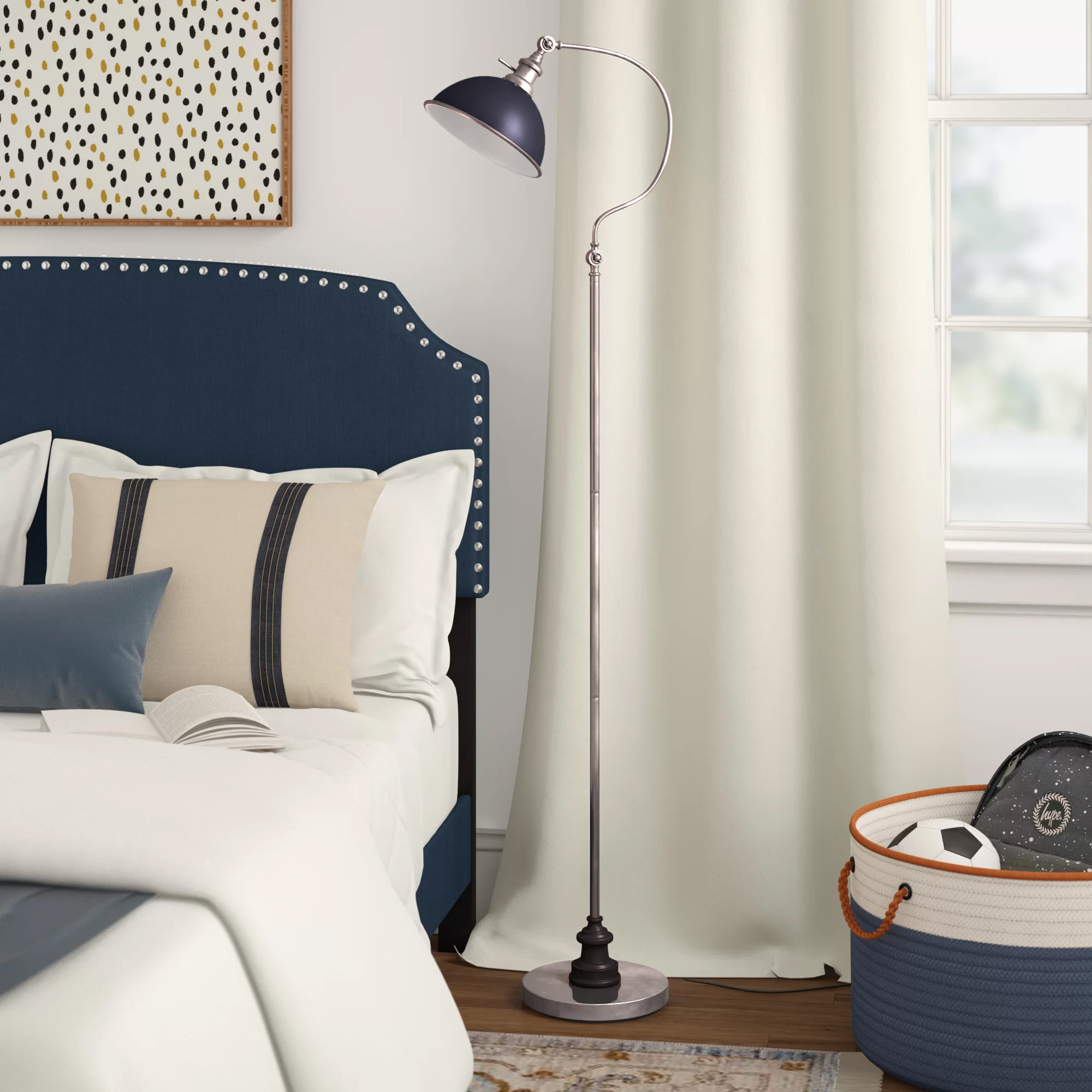 floor lamp beside bed