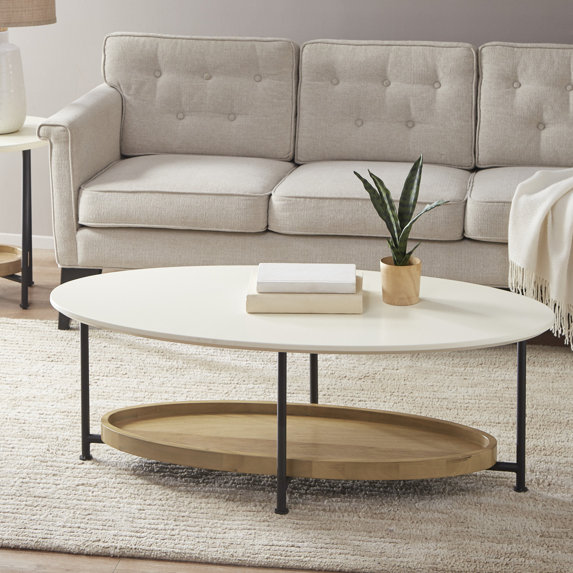 white oval coffee table with storage