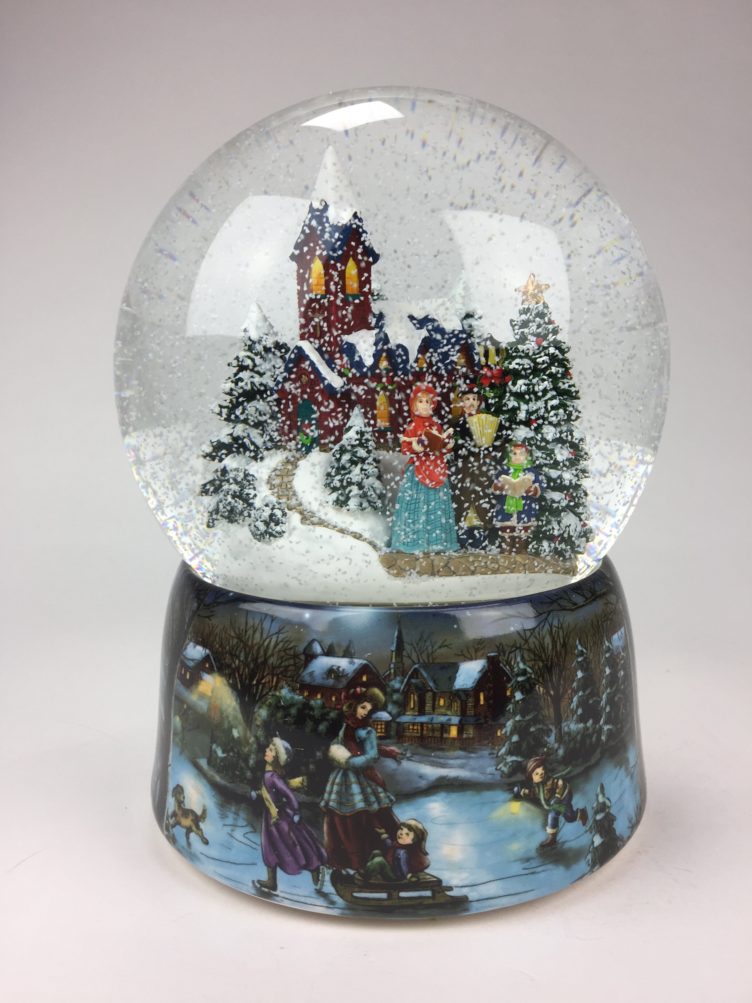 The Holiday Aisle® Snow Globe with a Winter Church Scene | Wayfair