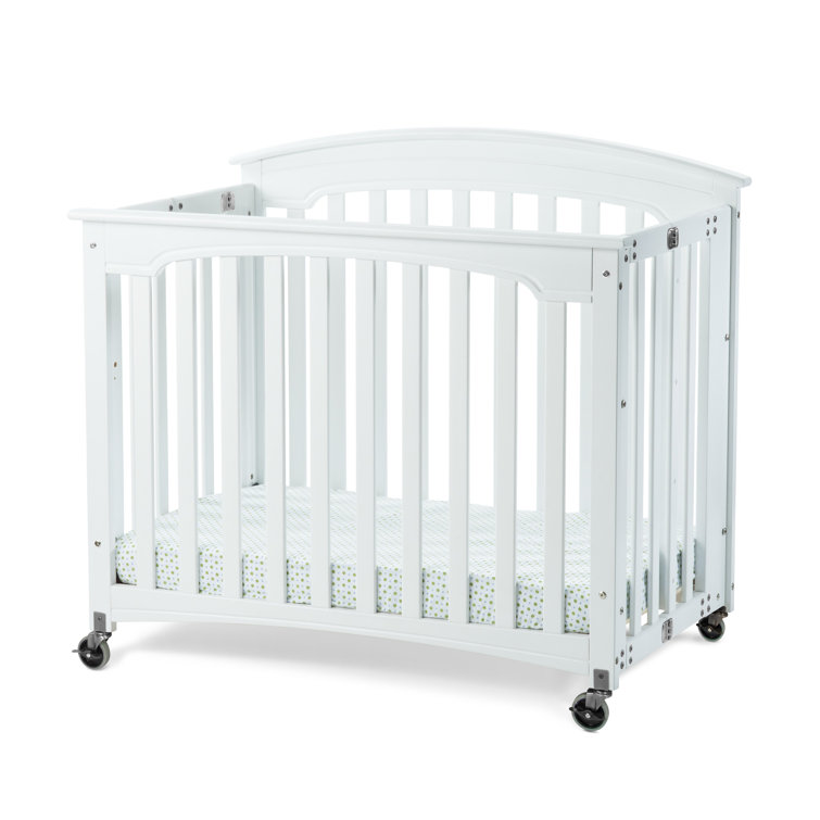 folding mini crib