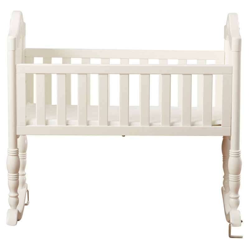 white rocking crib