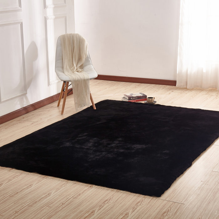 Orren Ellis Korman Plush Rabbit Skin Black Area Rug Reviews Korman Plush Rabbit Skin Black Area Rug