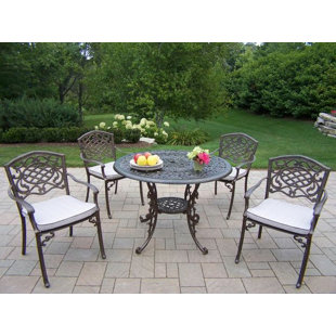 Go to store & view more images Mississippi 5 Piece Dining Set with Cushions by Oakland Living