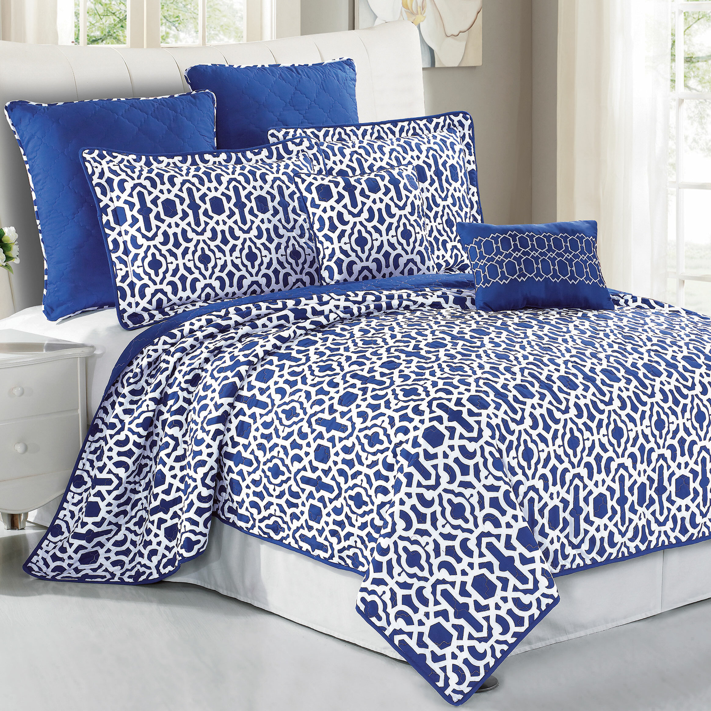 blue and white coverlet