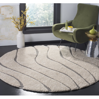 Ashal Animal Print Cream/Gray Area Rug