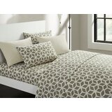 navy and white patterned bedding