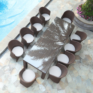 Shenelly Palm 11 Piece Dining Set with Cushions