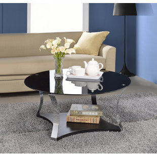 Go to store & view more images Orren Ellis Cassius Glass Coffee Table