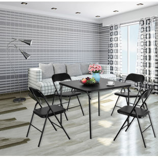 card table with padded folding chairs