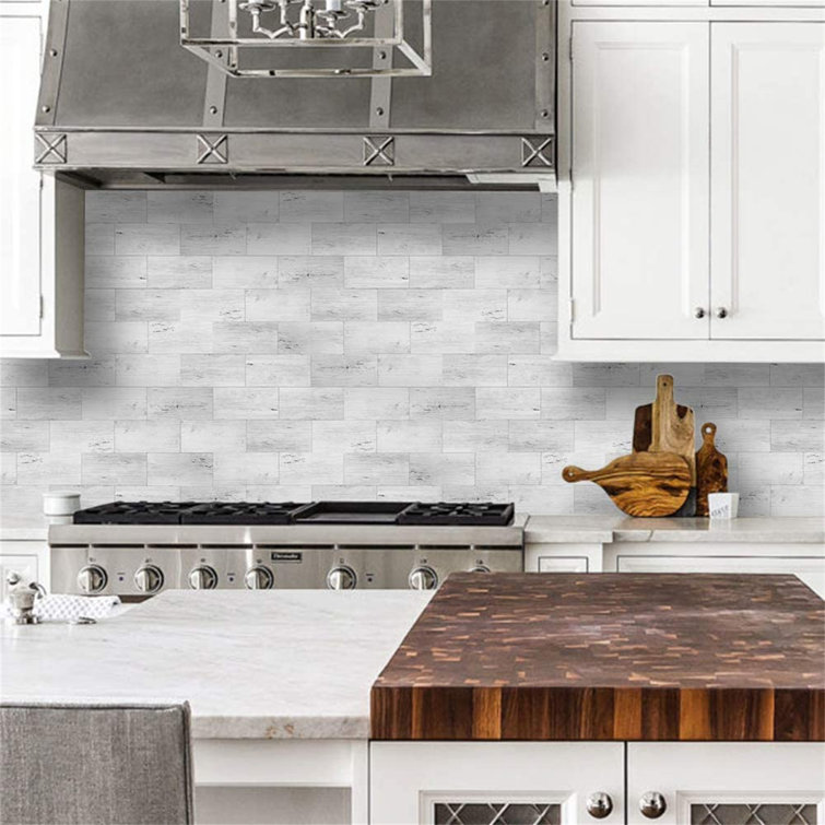 Light gray subway tile backsplash