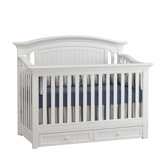 white crib with drawers