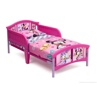 Go to store & view more images Minnie Mouse Plastic Toddler Bed by Delta Children