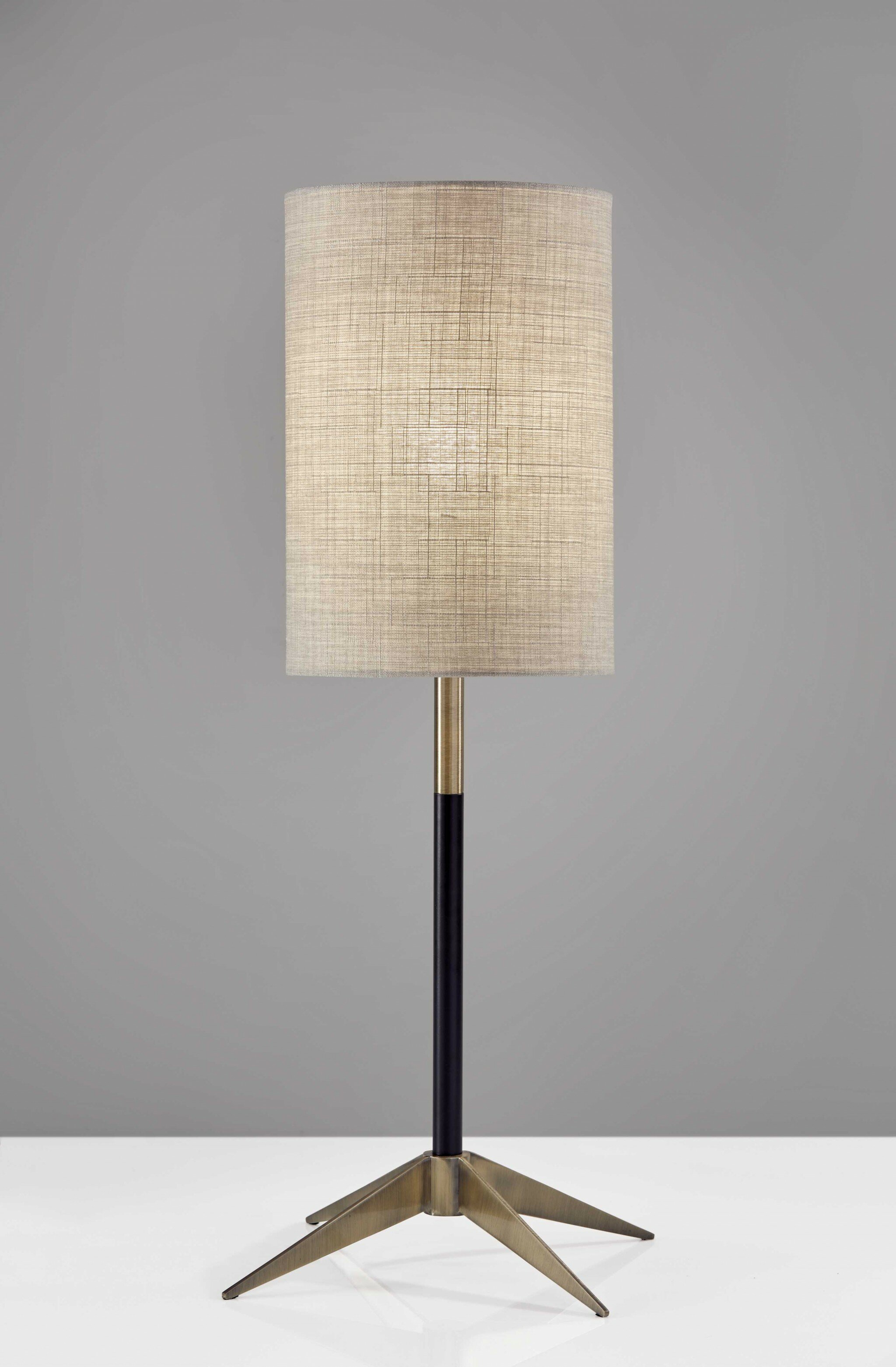 Antique Brass Metal Tripod Base With Matte Black Accent And Tall Natural  Fabric Shade Table Lamp