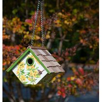 T pot fashioned into a wren birdhouse