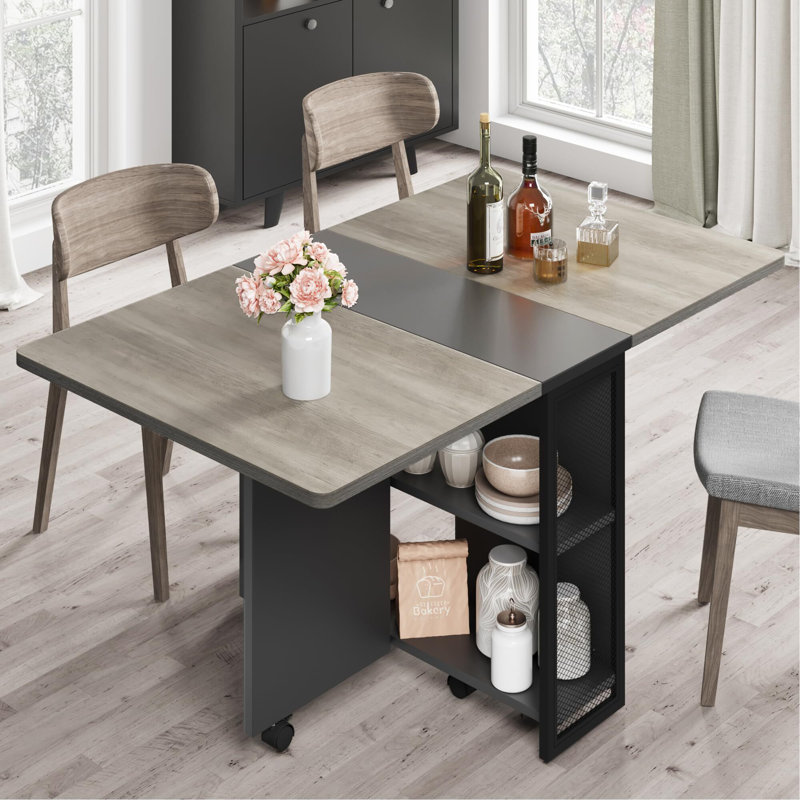 Daejuan Pedestal Dining Table Size: 23.6" H x 31.4" W x 50.1" L, Color: Dark Walnut