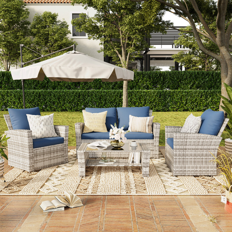 *incomplete* Rosolino 4 - Person Outdoor Seating Group with Cushions Cushion Color: Blue *similar to stock photo, item is a different color*