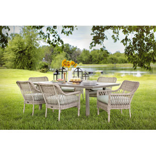 Go to store & view more images Paul 7 Piece Dining Set with Sunbrella Cushions by Rosecliff Heights