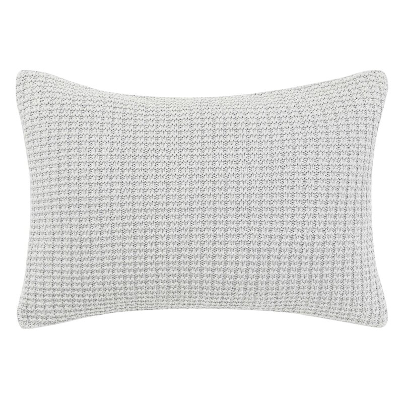grey and beige decorative pillows