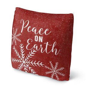 'Snowing Peace on Earth Outdoor Throw Pillow