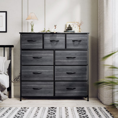 Hurd 9 Drawer Fabric Dresser with Wood Grains
