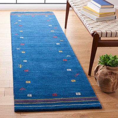 Danette Southwestern Wool Blue Area Rug