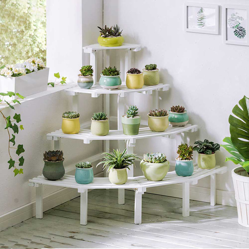 Arlmont Co Aloysius Triangular Corner Plant Stand Reviews Wayfair It can hold three planters and you can make it using the ikea ps plant stand, three wood plates, some glue. aloysius triangular corner plant stand