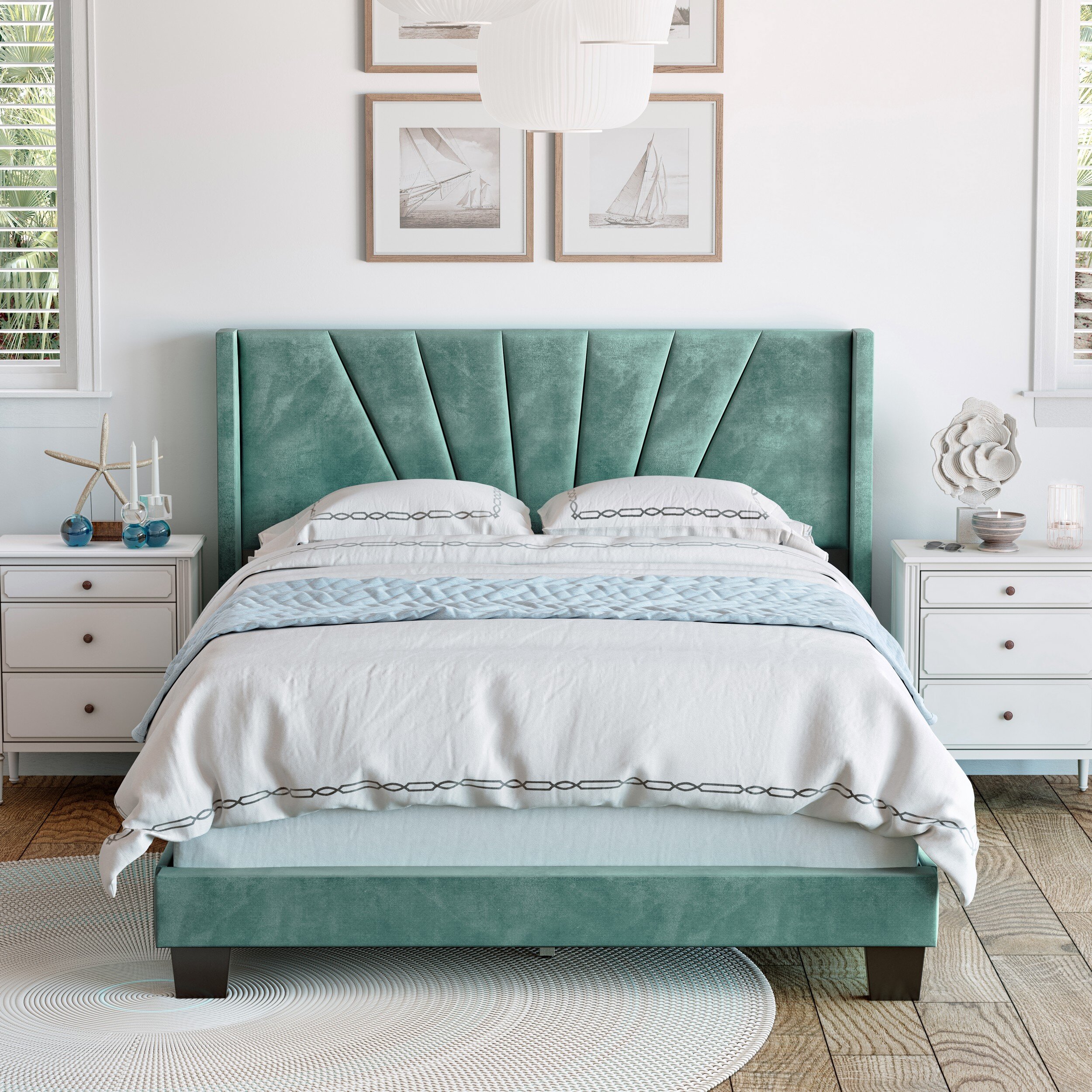 The headboard stitching evokes the rays of the sun or the lines in a seashe...