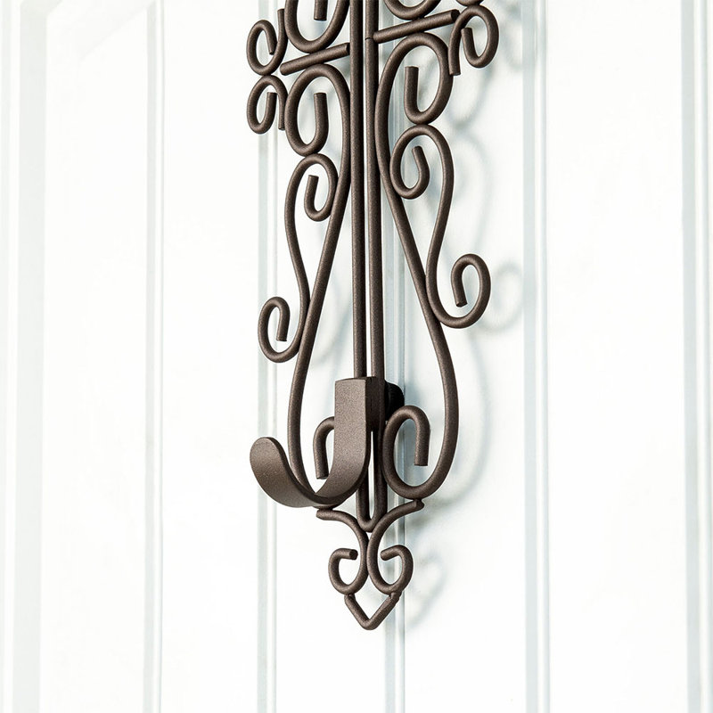 How about choosing one of such racks? 21 handmade black wrought iron door