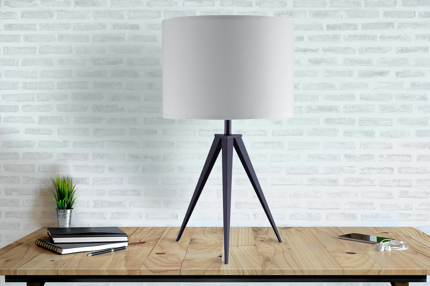 black tripod table lamp