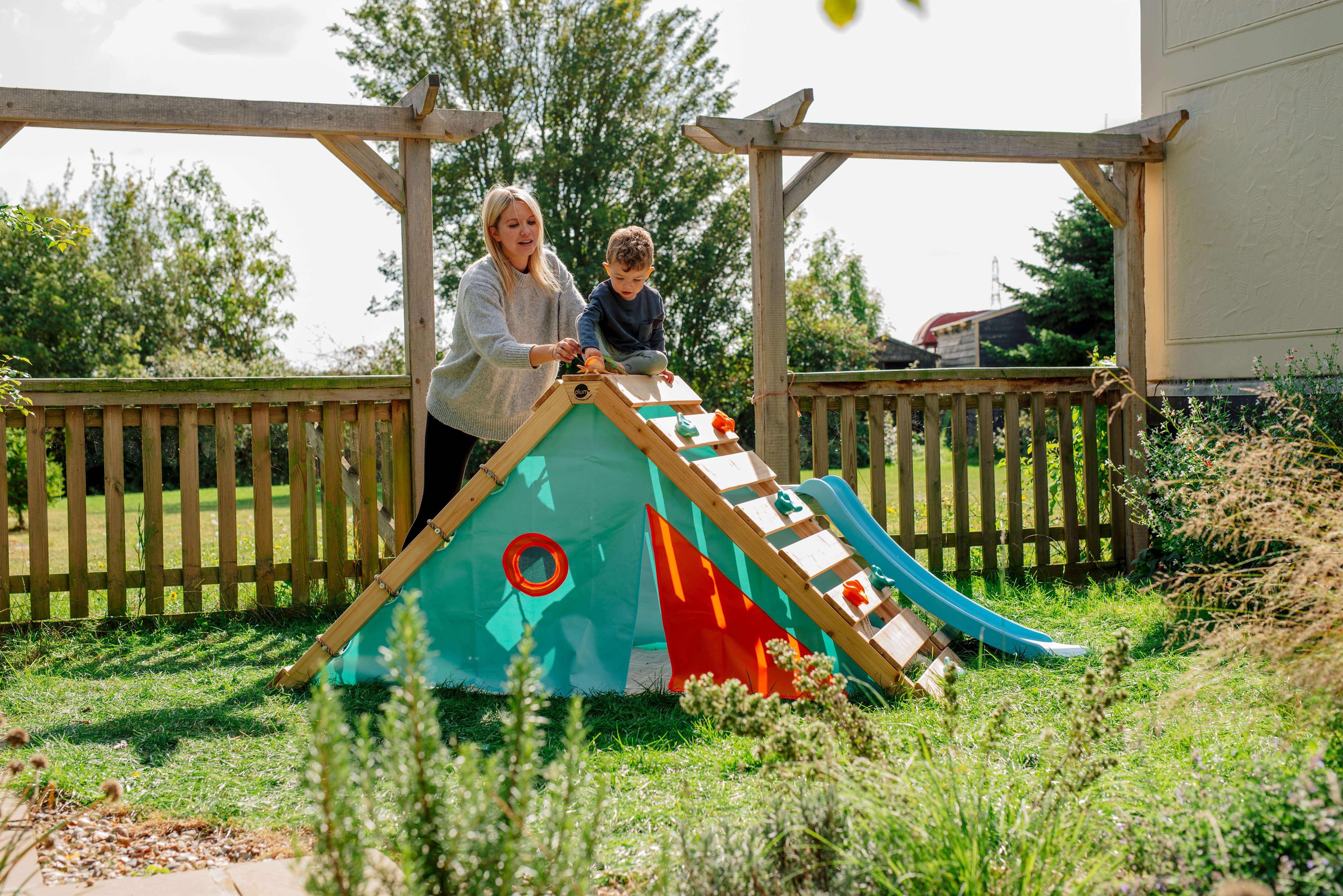 plum wooden swing set