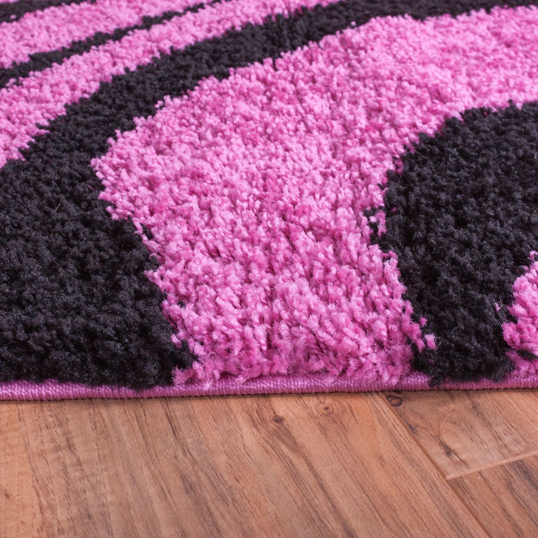 Zipcode Design Dante Zebra Animal Print Fuchsia Black Area Rug