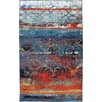 Turquoise and red area rug