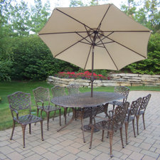 Bargain Mississippi 9 Piece Dining Set with Umbrella