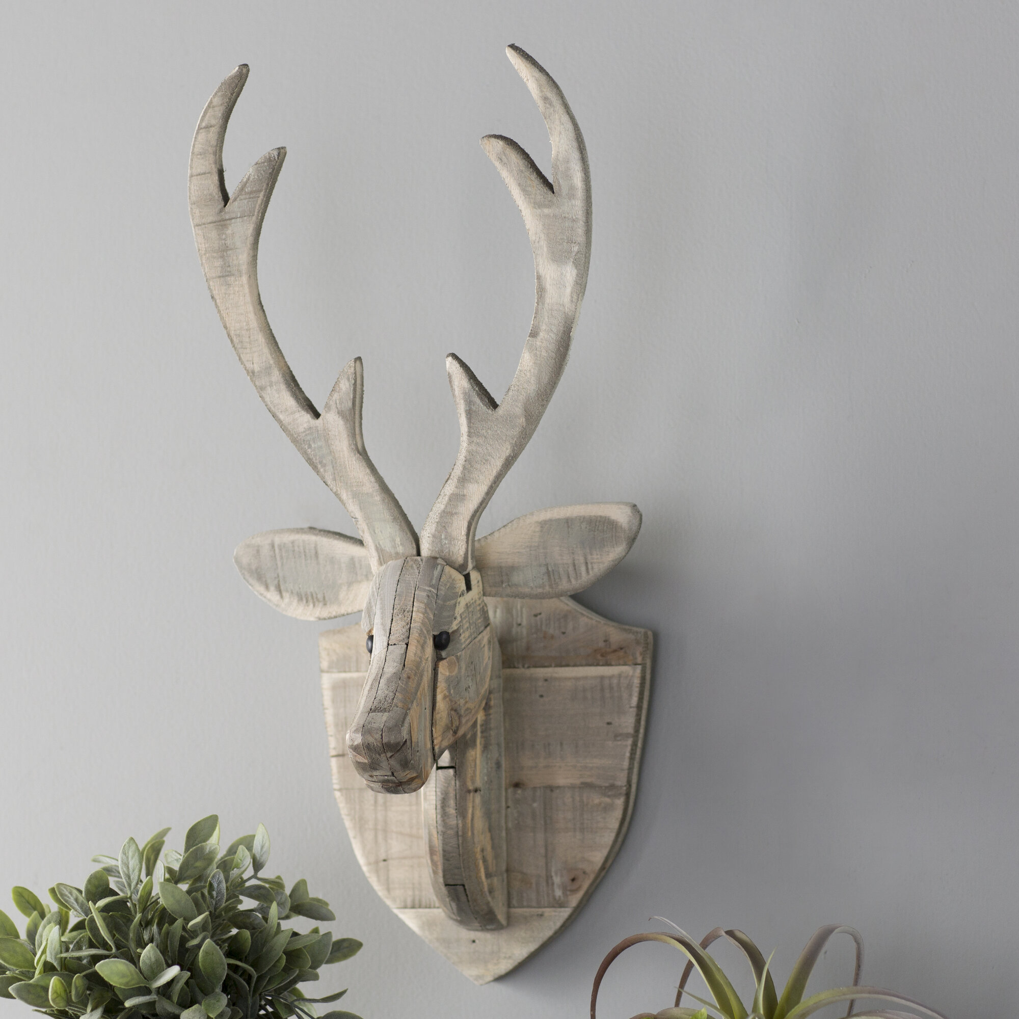 wooden deer sculpture