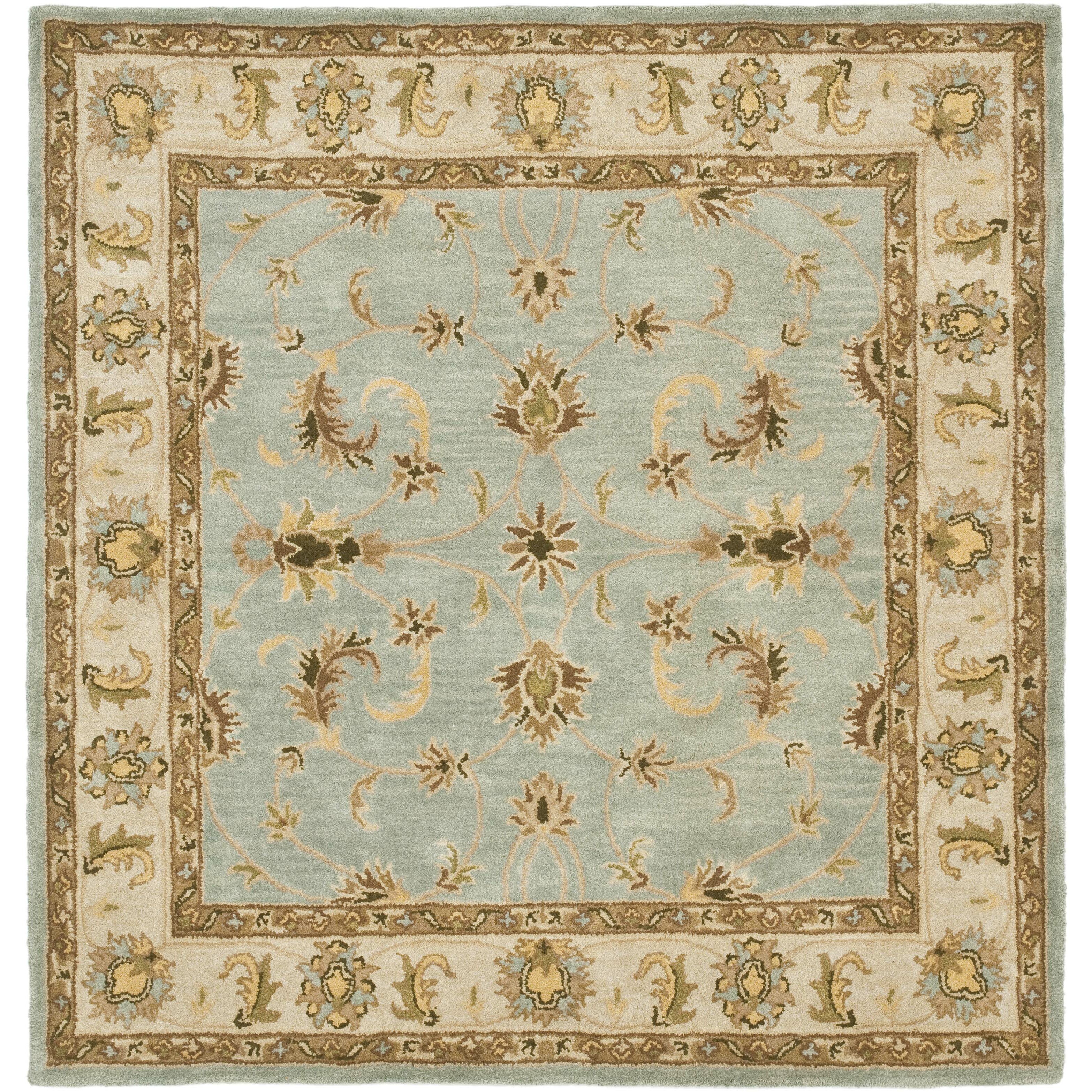 light blue and beige area rug