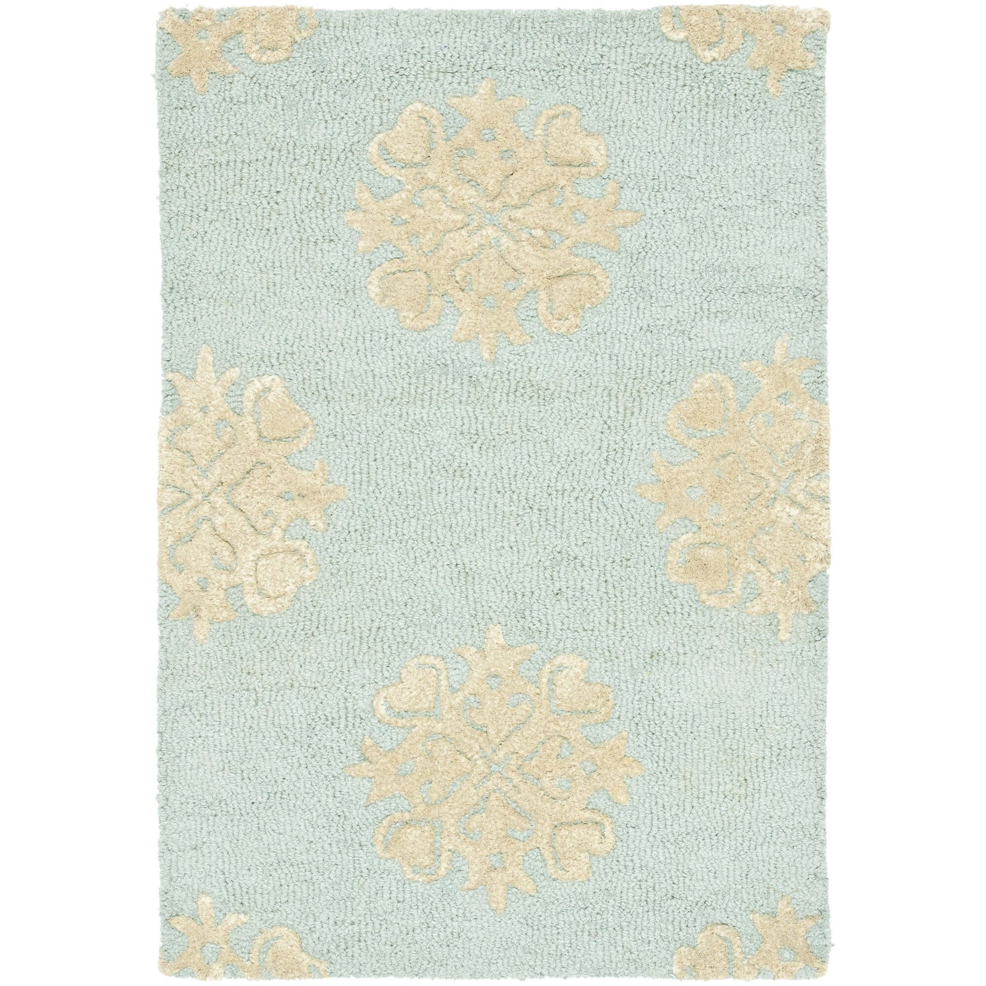 light blue and beige area rug