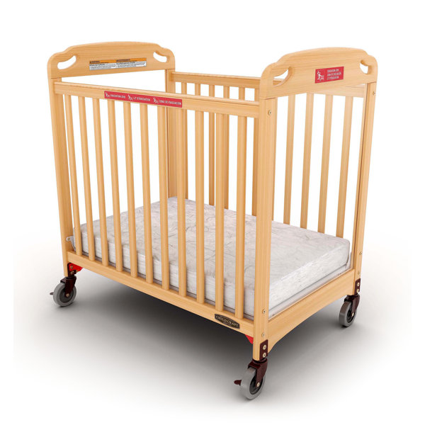 crib with sliding panel