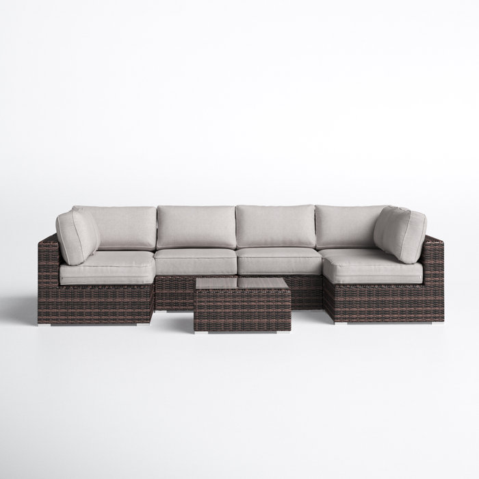 Joss and Main Conner 7 Piece Rattan Sectional Seating Group with Cushions