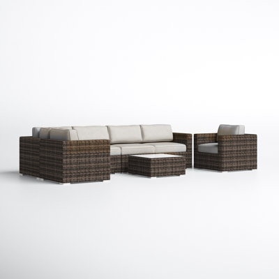 Conner 7 Piece Rattan Sectional Seating Group with Cushions by Joss and Main